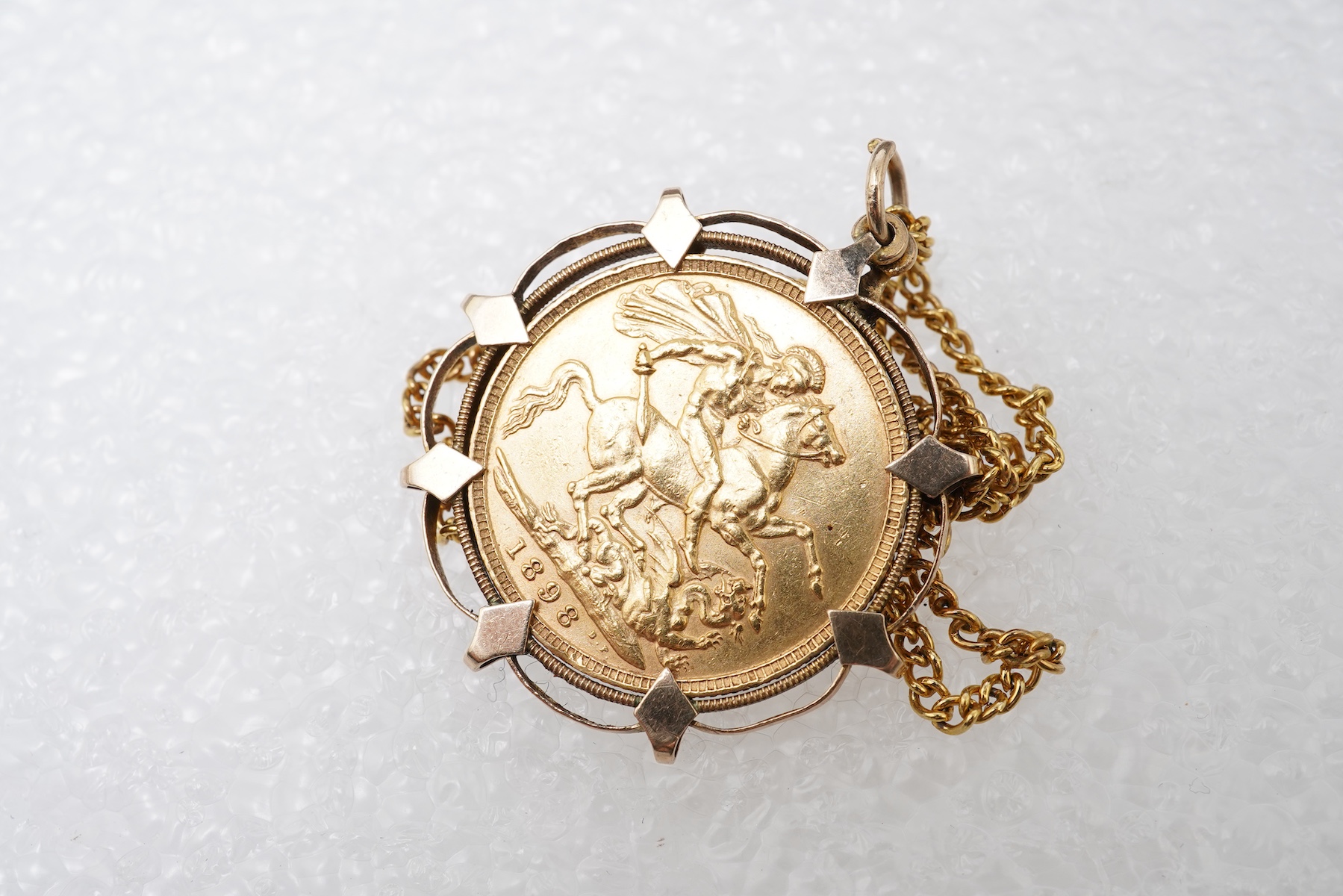 A Victorian sovereign coin pendant, circa 1898 and later